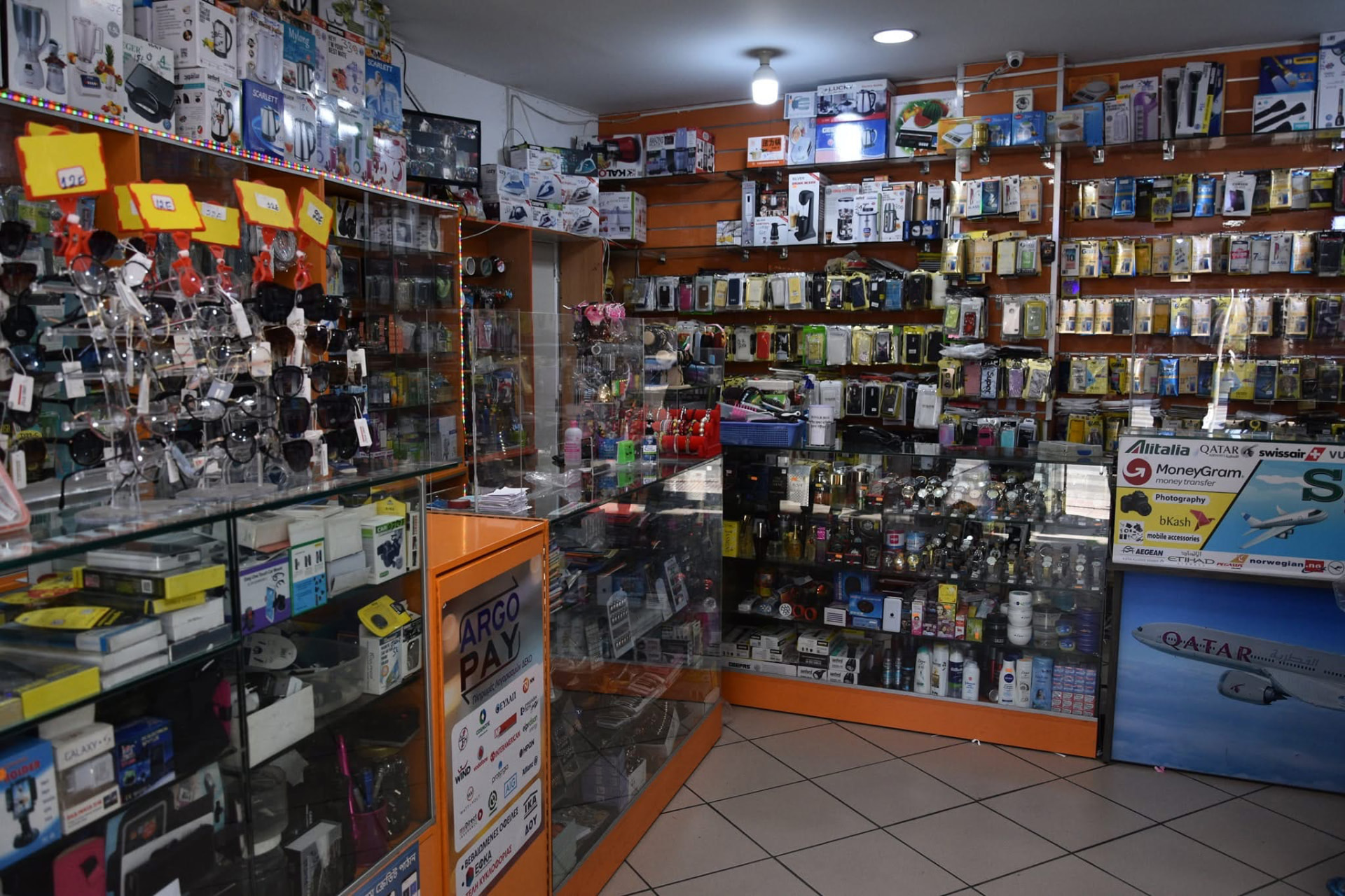 Inside Smart Mobile — shelves of phones and accessories